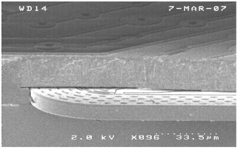 Figure 10. Resonator cross section SEM of cleaved wafer-483x302.png